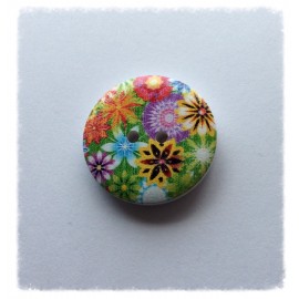 Bouton rond peint de motifs floraux