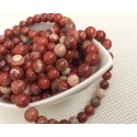 Perles de jaspe rouges marbrées