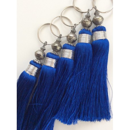 Breloque pompon bleu électrique