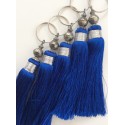 Breloque pompon bleu électrique