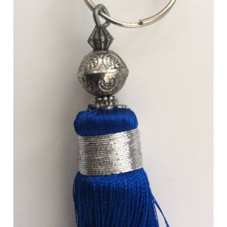 Breloque pompon bleu électrique