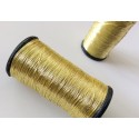 Bobine de fil doré Bobine de fil doré