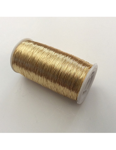 Bobine de fil doré