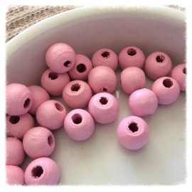 12 perles roses rondes en bois