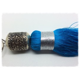 Grand pompon en soie turquoise 2